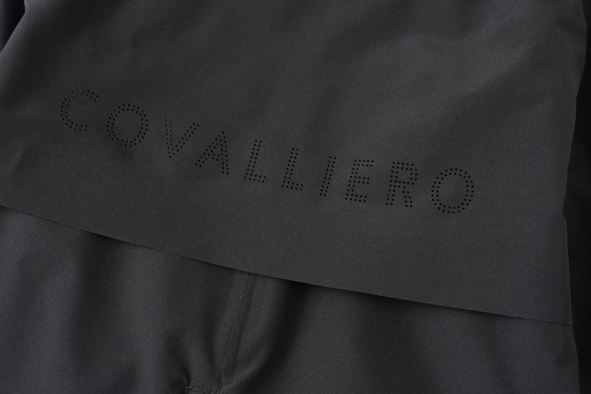 COVALLIERO Regnfrakke med rideslids. Junior. Sort